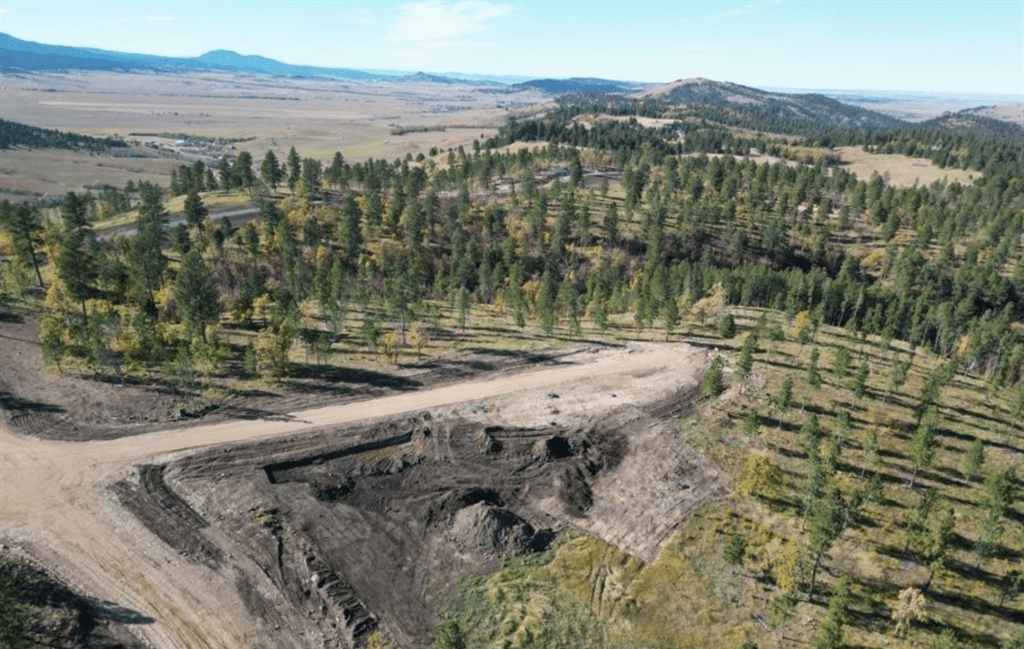 Aerial view of a custom home site at Three Peaks Ranch where Legacy Custom Homes & Design is building on acreage in the Black Hills.