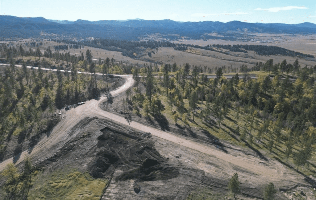 Aerial view of a custom home site at Three Peaks Ranch near Whitewood, SD where Legacy Custom Homes & Design is building on acreage in the Black Hills.